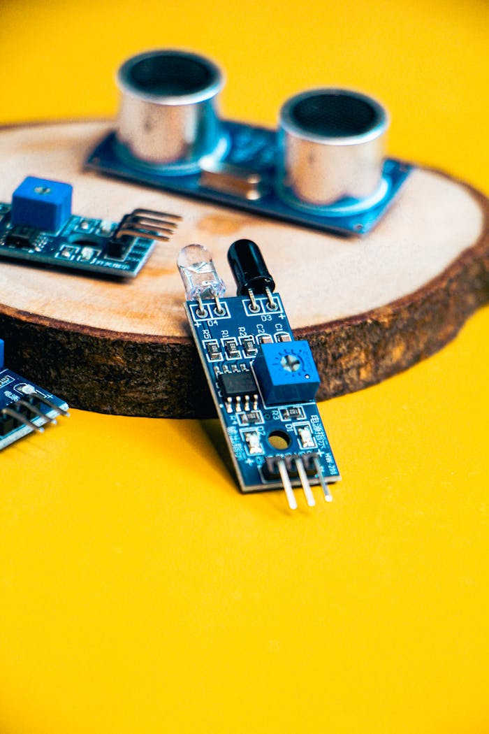 High-quality close-up of robotics parts displayed on a wooden base, ideal for tech enthusiasts.